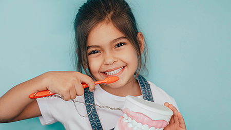 Artistic Family Dental | Dentures, Implant Restorations and Emergency Treatment